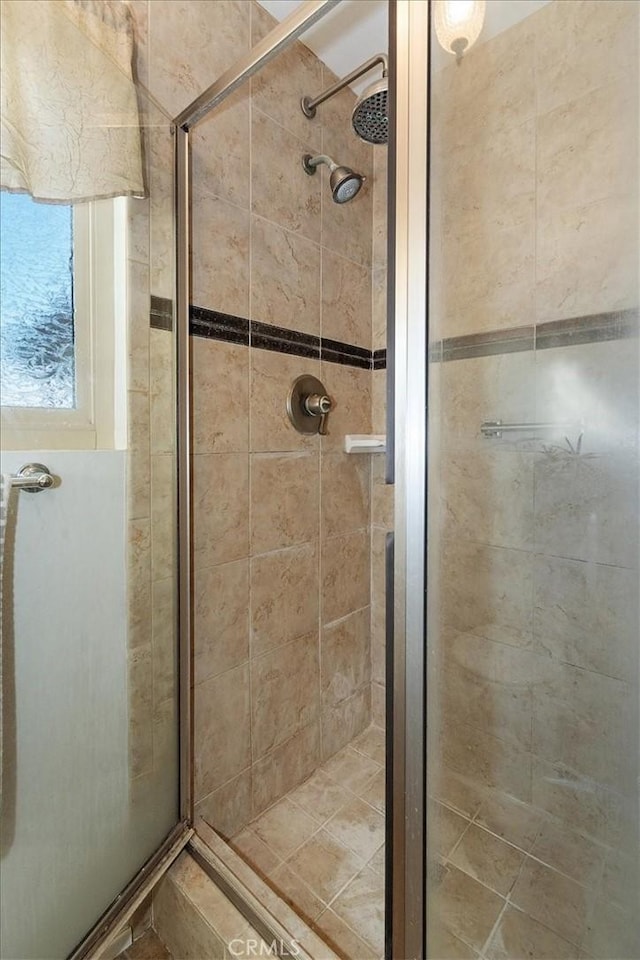 bathroom with an enclosed shower