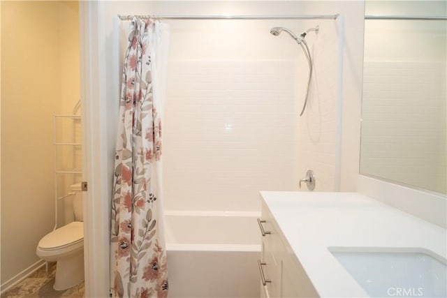 full bathroom featuring shower / tub combo with curtain, vanity, and toilet