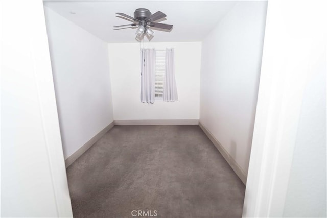 empty room with carpet flooring and ceiling fan