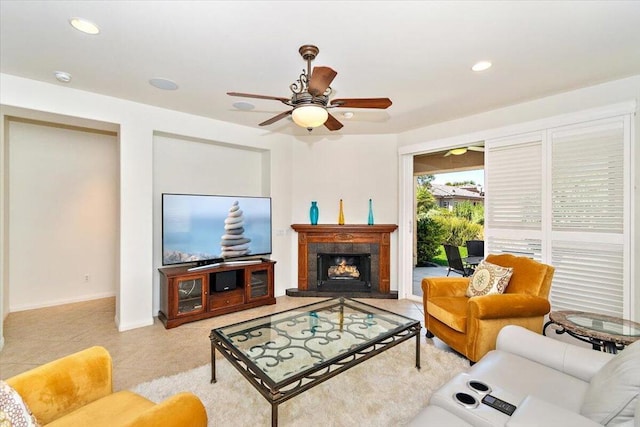 living room with ceiling fan and light tile patterned floors