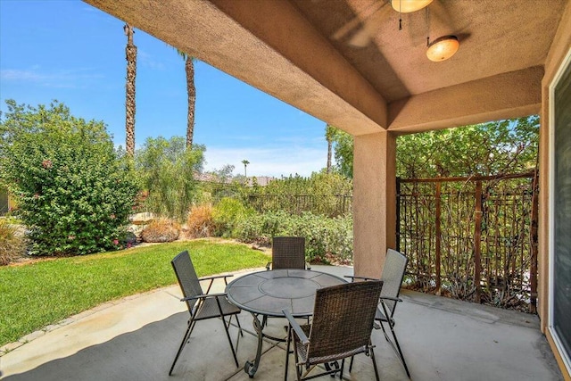 view of patio featuring ceiling fan