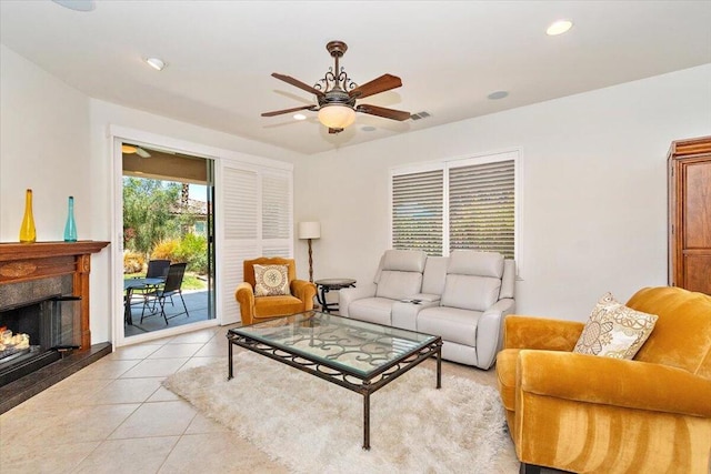 tiled living room featuring ceiling fan