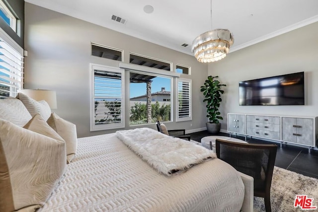 bedroom featuring tile patterned flooring, crown molding, and a chandelier