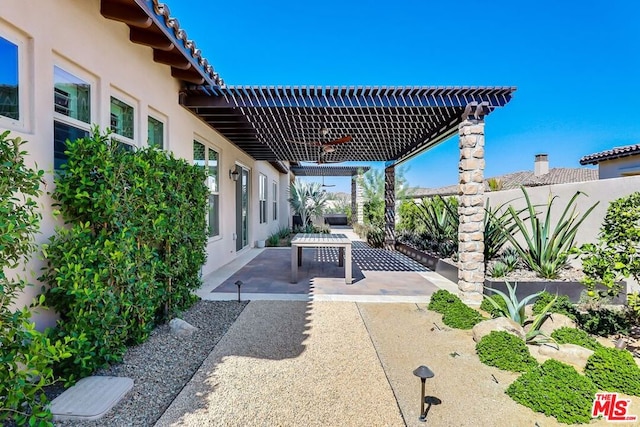 view of patio / terrace with ceiling fan