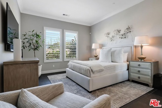 bedroom featuring ornamental molding