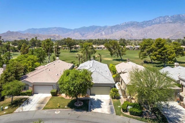 birds eye view of property featuring a mountain view