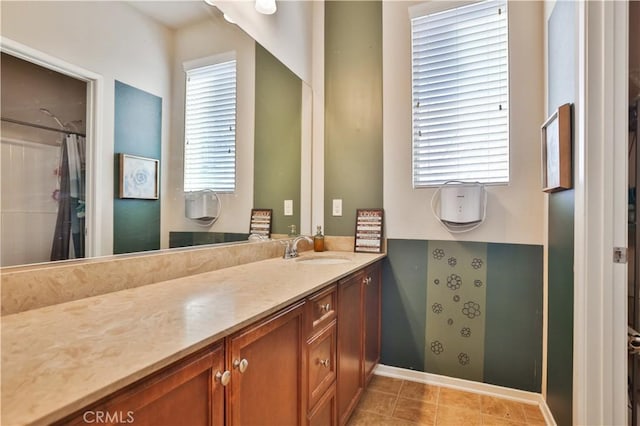 bathroom featuring vanity and a wealth of natural light