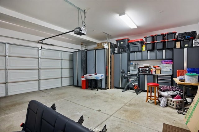 garage featuring a garage door opener