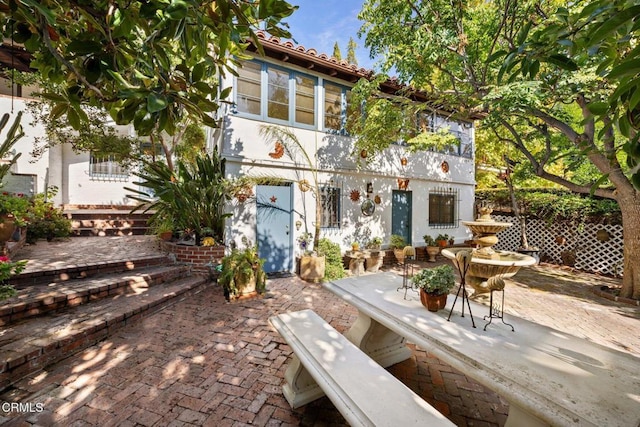 rear view of property with a patio