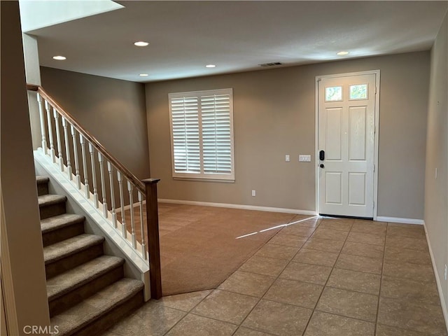 entryway featuring tile patterned flooring