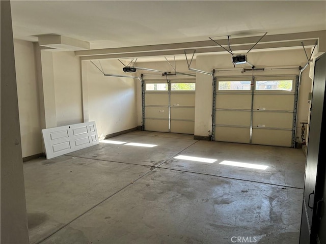 garage featuring a garage door opener