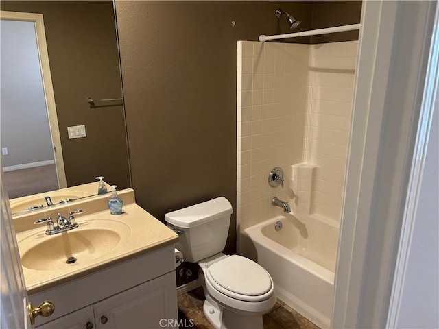 full bathroom featuring tile patterned flooring, vanity, tub / shower combination, and toilet