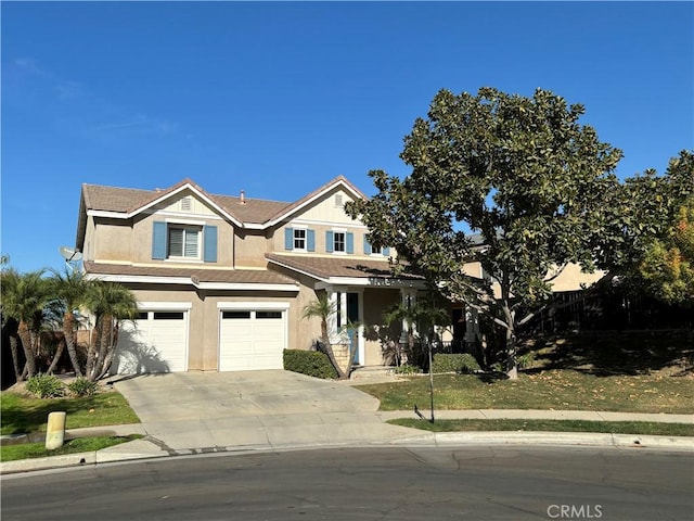 view of front of property featuring a garage