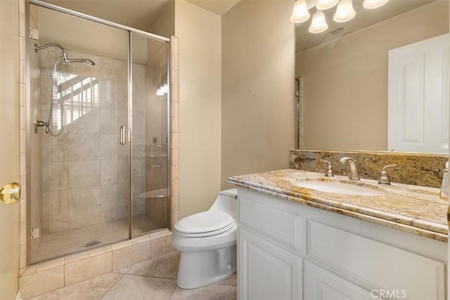 full bath with tile patterned flooring, toilet, vanity, and a shower stall