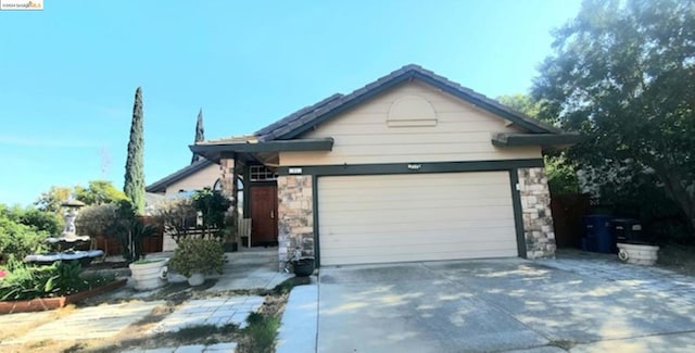 view of front of home with a garage