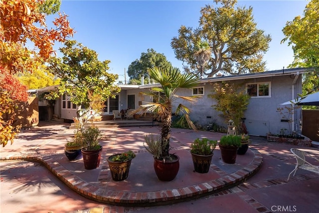 view of front of home featuring a patio area