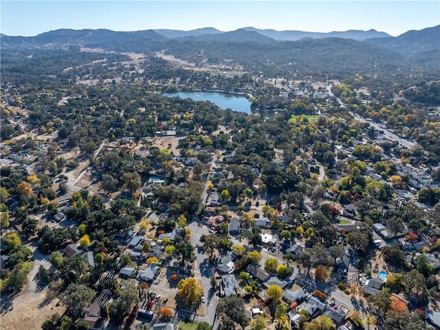 bird's eye view featuring a water and mountain view