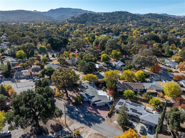 drone / aerial view featuring a mountain view