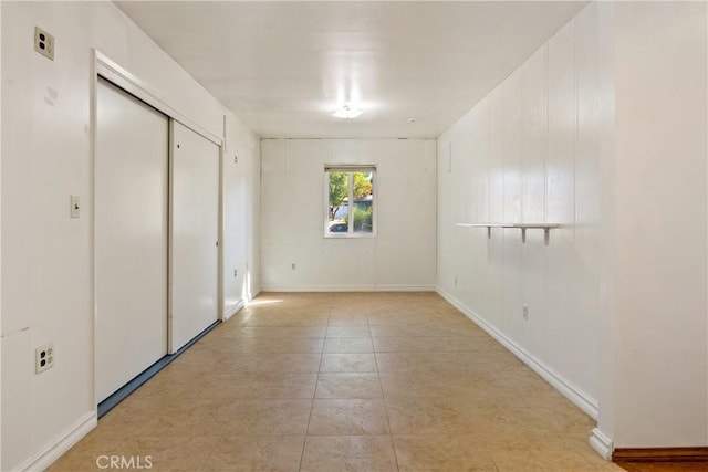 unfurnished bedroom featuring a closet