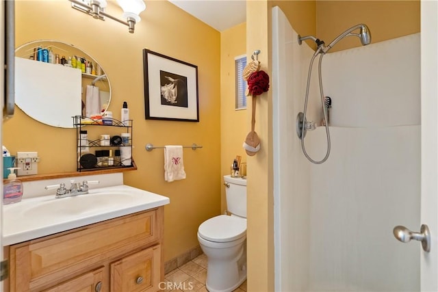 bathroom featuring tile patterned flooring, a shower, vanity, and toilet