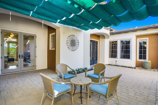 view of patio featuring french doors