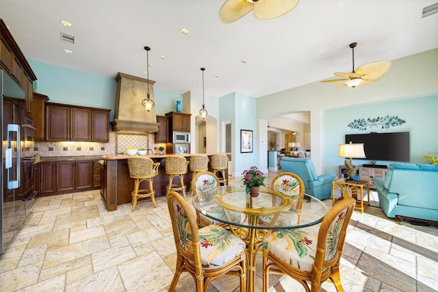 dining area with ceiling fan