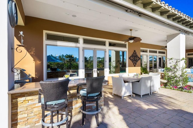 view of patio featuring french doors