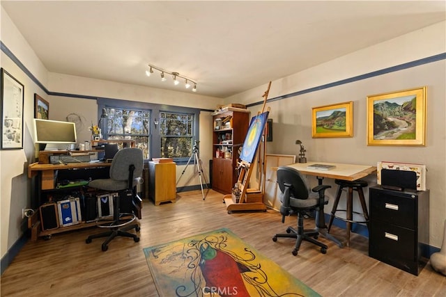 office area with wood-type flooring