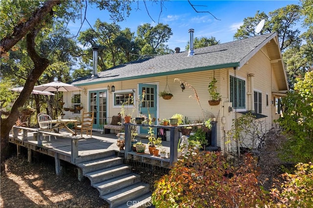 view of front of property with a wooden deck