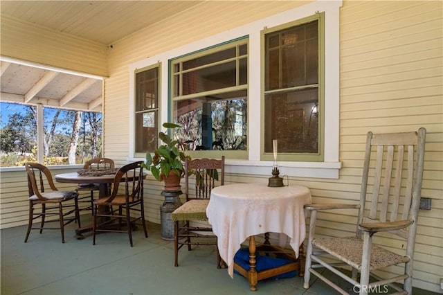 sunroom with wood ceiling