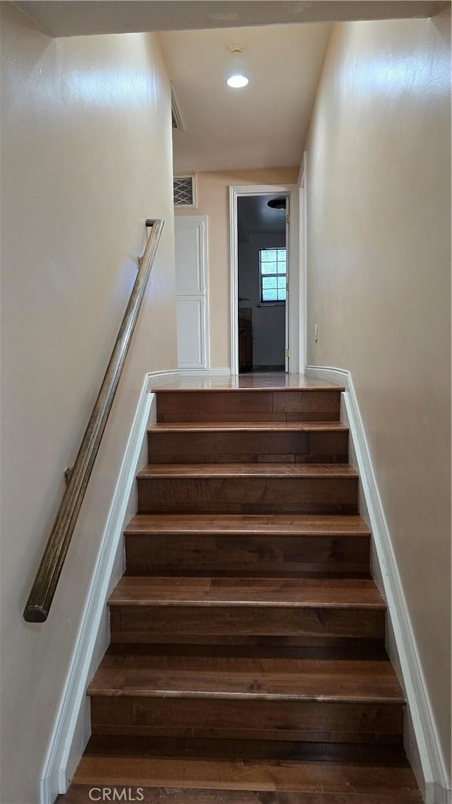3930 Ironwood St, San Bernardino, CA 92404 - staircase with visible vents, recessed lighting, and wood finished floors