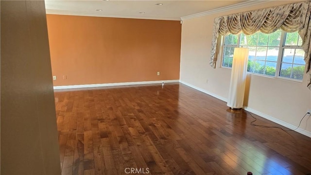 3930 Ironwood St, San Bernardino, CA 92404 - unfurnished room with ornamental molding, baseboards, and hardwood / wood-style flooring
