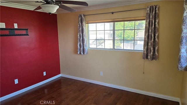 unfurnished room with crown molding and dark wood-type flooring