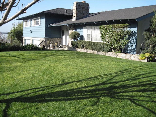 view of front of house with a front yard