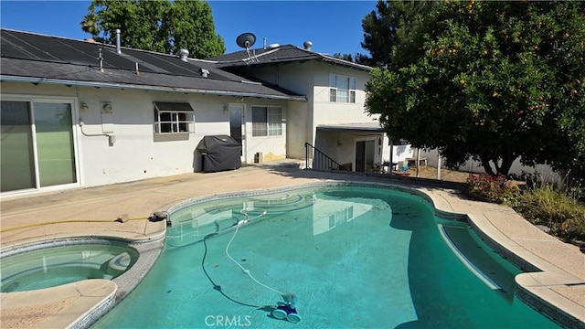 3930 Ironwood St, San Bernardino, CA 92404 - pool with an in ground hot tub, a patio, and a grill