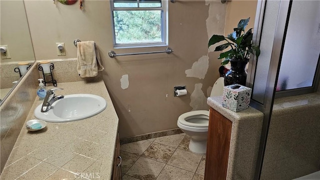 bathroom featuring sink and toilet