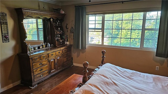 3930 Ironwood St, San Bernardino, CA 92404 - bedroom featuring crown molding, baseboards, and dark wood-style floors