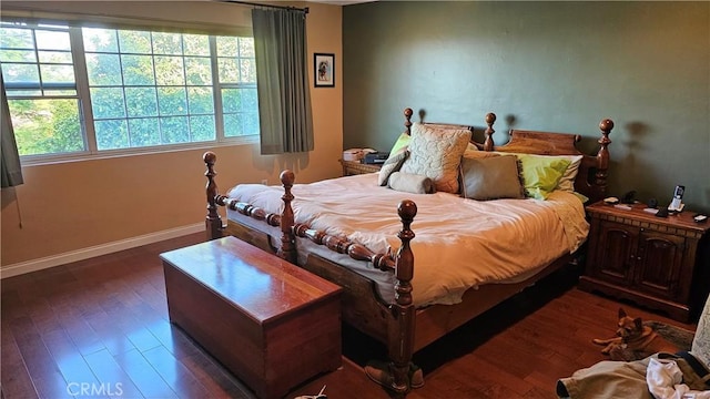 bedroom featuring dark wood-type flooring