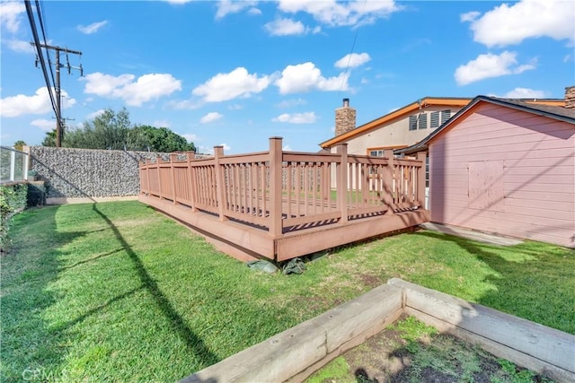 view of yard featuring fence private yard and a wooden deck