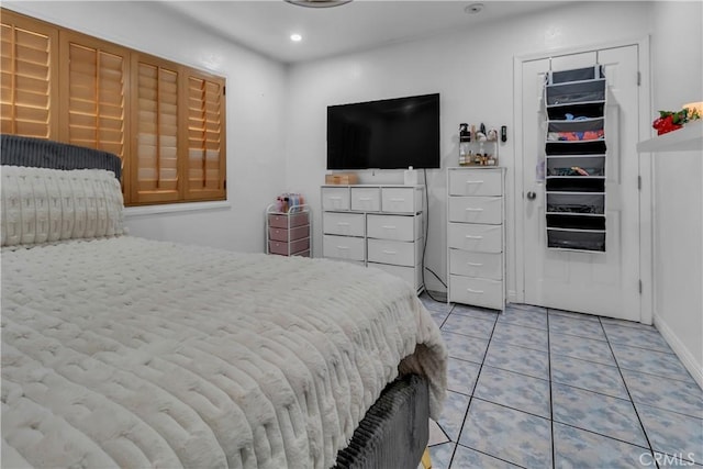 bedroom featuring recessed lighting and light tile patterned flooring