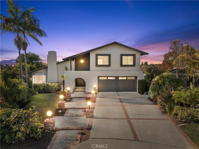 view of front of home with a garage