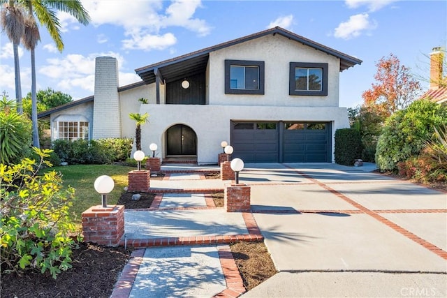 view of front of property with a garage