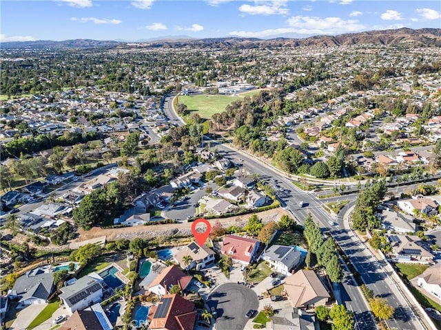 bird's eye view with a mountain view