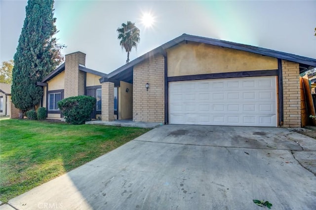 ranch-style home featuring a front lawn and a garage