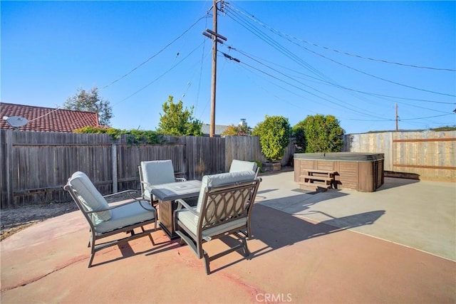 view of patio featuring a hot tub