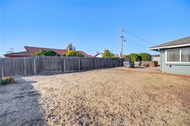 view of yard with a patio area