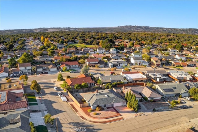 drone / aerial view featuring a mountain view