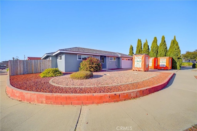 ranch-style home with a garage