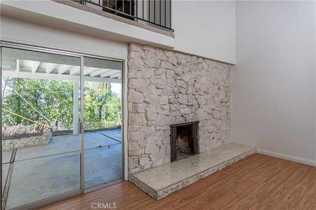 interior space featuring a fireplace and hardwood / wood-style flooring