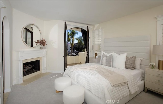 bedroom with light colored carpet